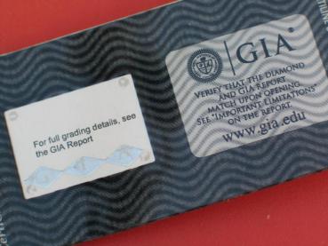 Diamant im Brillantschliff 0.54 ct/ I2 mit GIA Report Faint Brown / K Laser Inscription Registry