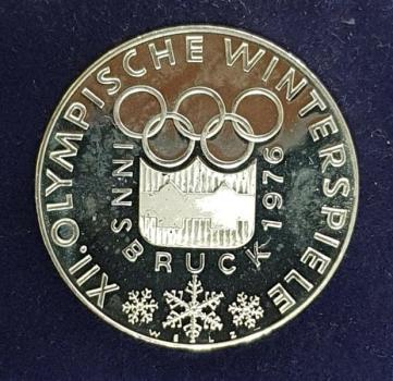 100 Schilling Münze "Olympische Winterspiele 1976" aus 640er Silber, Logo