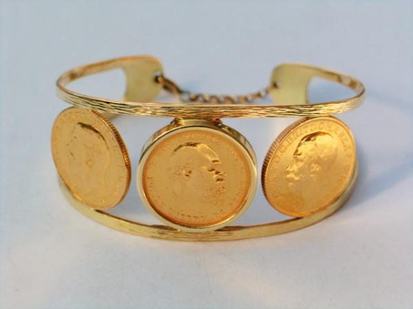 Armspange mit 2x Sovereign und 1x Gulden Goldmünzen 900er Gold, Handarbeit, Gewicht 40,8 Gramm