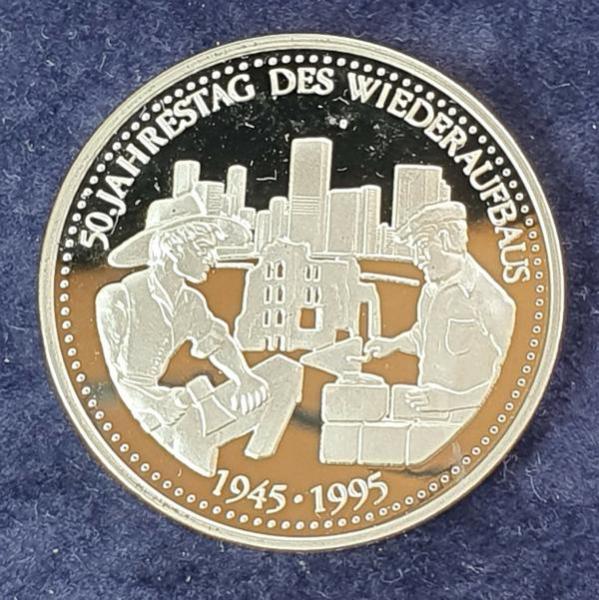 Silbermedaille -50 Jahre Wiederaufbau- 999,9 Feinsilber, Gewicht: 15,0g