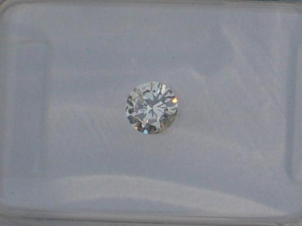 Diamant im Brillantschliff 0.21 ct/ VS 2/ L/ G/ G/ G/ mit IGI Report