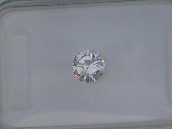 Diamant im Brillantschliff, 0.27 ct. mit IGI Report: Farbe: D , Reinheit: VS 1