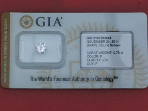 Diamant im Brillantschliff 0.75 ct. Color F, Clarity: VS1 mit GIA Report, Laser Inscription