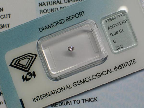 Diamant im Brillantschliff 0.08 ct/ G/ SI2/ G/ VG/ G/ N mit IGI Report