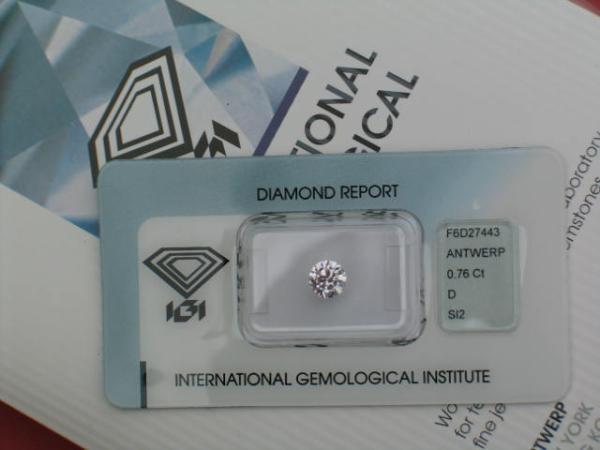 Diamant im Brillantschliff "D" 0.76 ct. /SI2/EX/ VG/ VG mit IGI Report