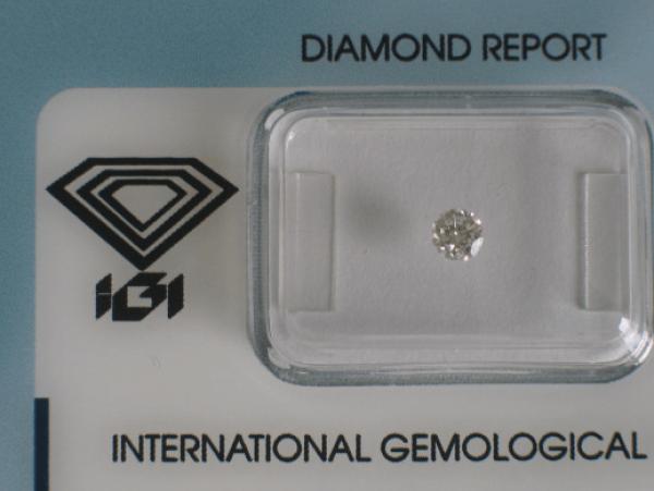 Diamant im Brillantschliff 0.21 ct / SI1 / G / F / G / F / mit IGI Report