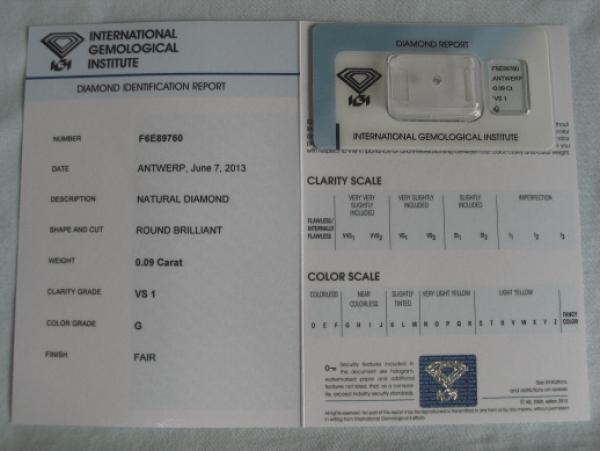 Diamant im Brillantschliff 0.09 ct / VS1 / G / Fair / mit IGI Report