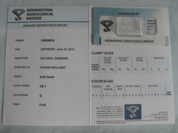 Diamant im Brillantschliff 0.06 ct / VS1 / G / Fair / mit IGI Report