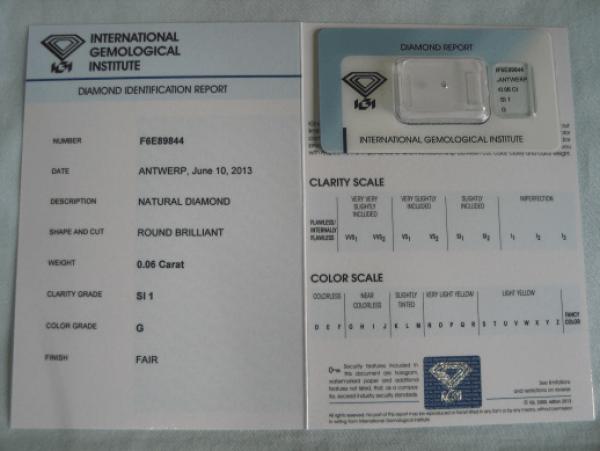 Diamant im Brillantschliff 0.06 ct / SI1 / G / Fair / mit IGI Report
