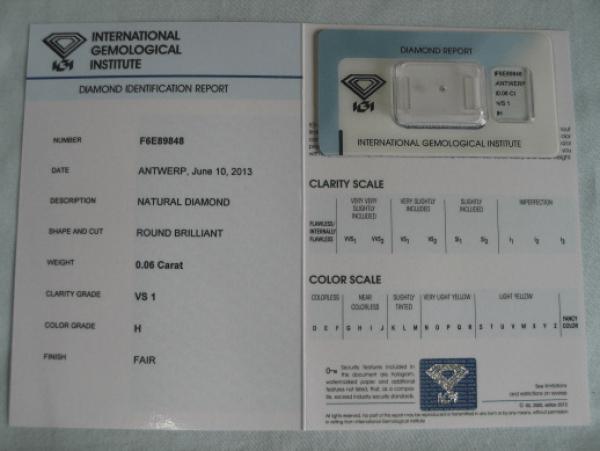 Diamant im Brillantschliff 0.06 ct / VS1 / H / Fair / mit IGI Report