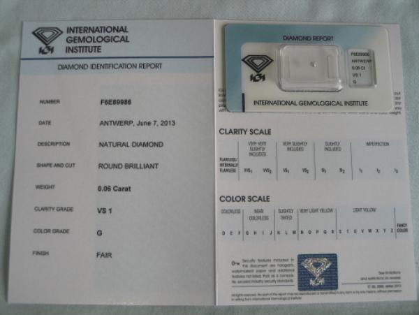 Diamant im Brillantschliff 0.06 ct / VS1 / G / Fair / mit IGI Report