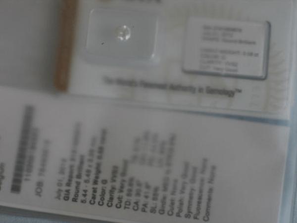 Diamant im Brillantschliff "G" 0.58 ct / VVS2 mit GIA Report, Laser Inscription Registry