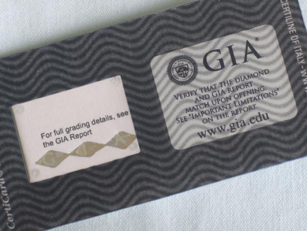 Diamant im Brillantschliff "E" 0.52 ct / SI1 mit GIA Report, Laser Inscription Registry