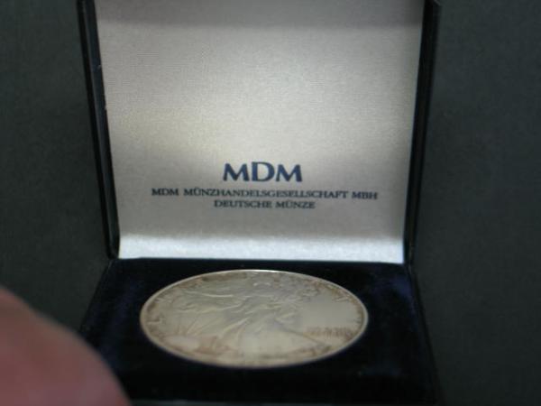 1 oz American Eagle 1987 Silbermünze, USA, 999er Feinsilber in MDM Münzetui und Zertifikat